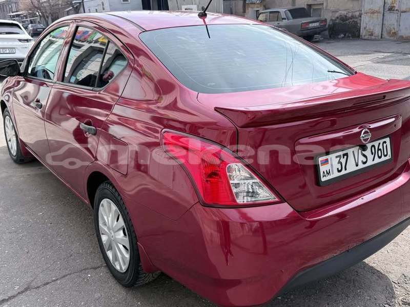 Big with watermark nissan versa lori akhtala 6341